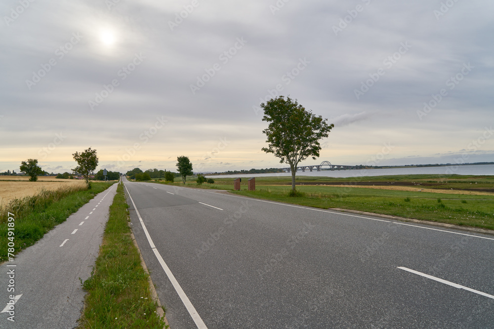 Obraz premium Empty asphalt street with separated bike lane in Sweden