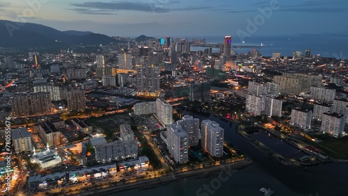 George Town, Penang, Malaysia with city lights. Flying over skyscrapers and avenues after sunset in GeorgeTown, Penang © SJ Travel Footage