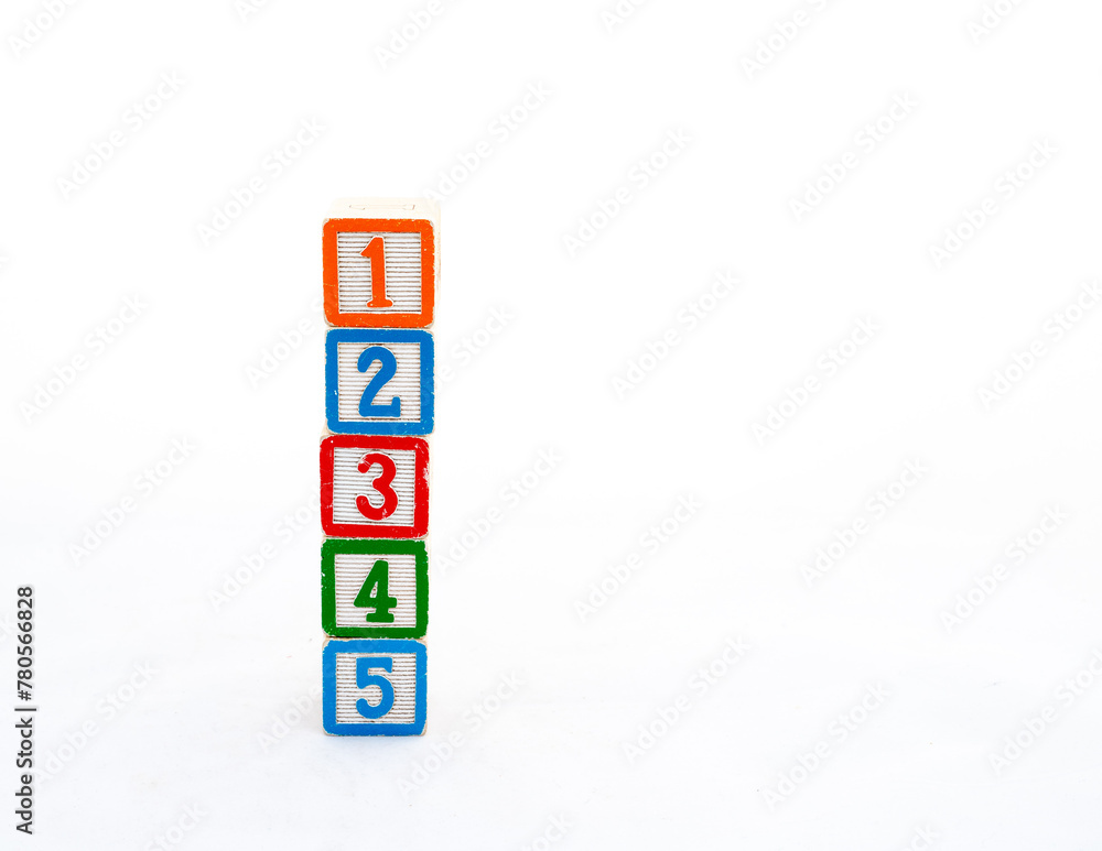 Educational toy blocks tower with 1, 2, 3, 4 and 5 numbers isolated on white background Educational toy blocks tower with 1, 2, 3, 4 and 5 numbers isolated on white background