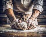 Primer plano de unas manos amasando masa para hacer pan. Cocinero amasando con las manos sobre una mesa de madera. Concepto Día internacional del trabajador.