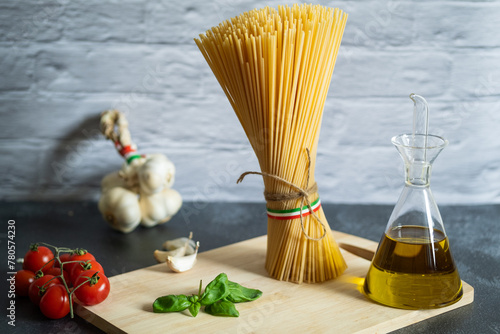 Italian kitchen with spaghetti pasta noodles raw ingredient 