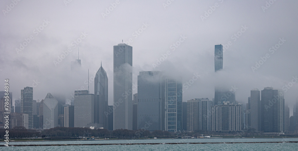 Naklejka premium Chicago skyline as seen from Michigan lake during foggy, rainy afternoon