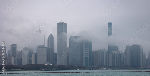 Chicago skyline as seen from Michigan lake during foggy, rainy afternoon