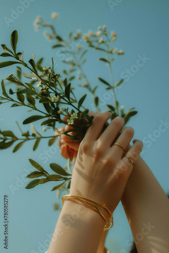 close-up of female hands holding small margaritas and branches, vintage look, aesthetic, grainy, lo-fi vibes, zen mode