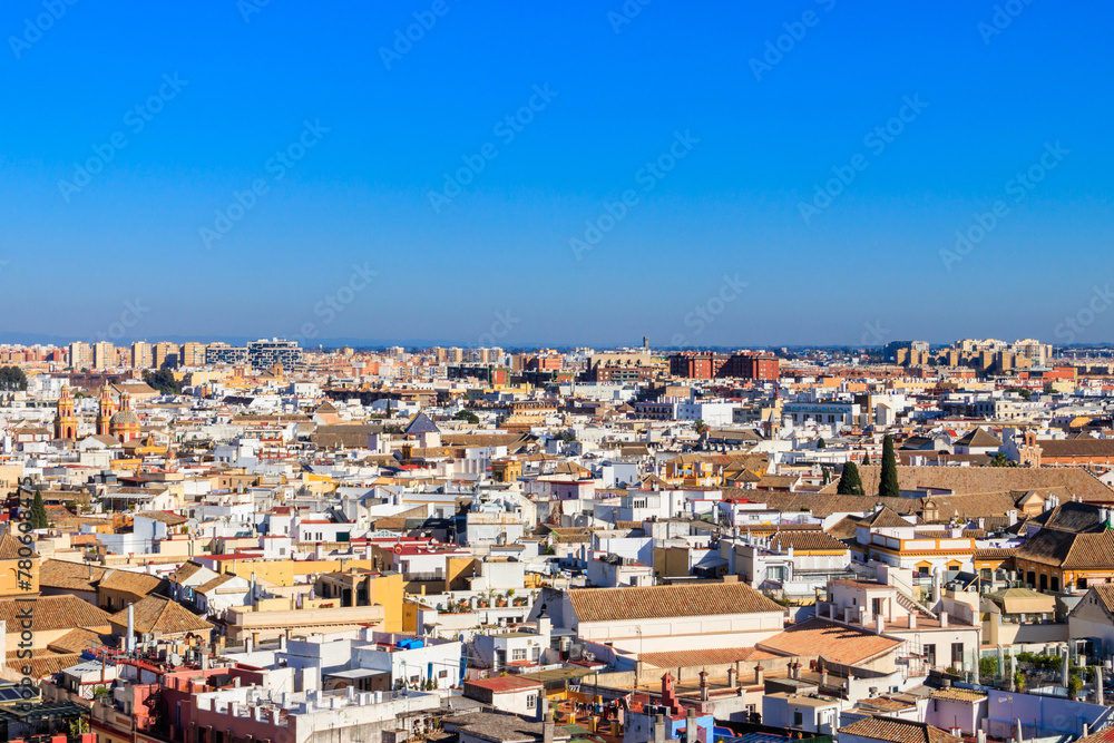 Aerial panoramic view of the old city rooftops from the Giralda Tower in Seville, Andalusia, Spain
