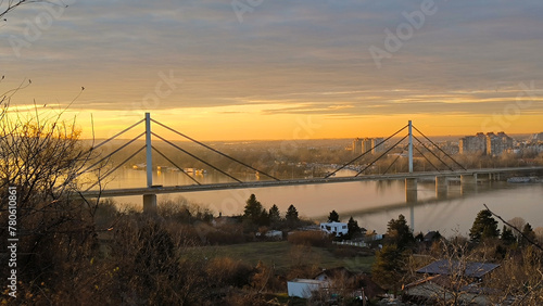 sunset over the Danube river and city of Novi Sad in Serbia photo