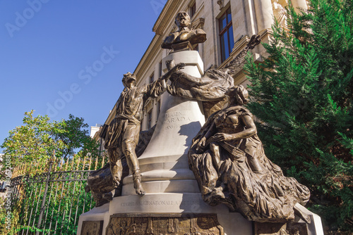 Eugeniu Carada 1924 monument, dedicated to the first director of the National Bank of Romania with bronze statues, Bucharest, Romania photo