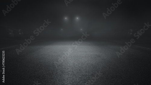 Minimalistic wet road and rain. Wet empty highway. Spotlight illuminates asphalt, smoke.