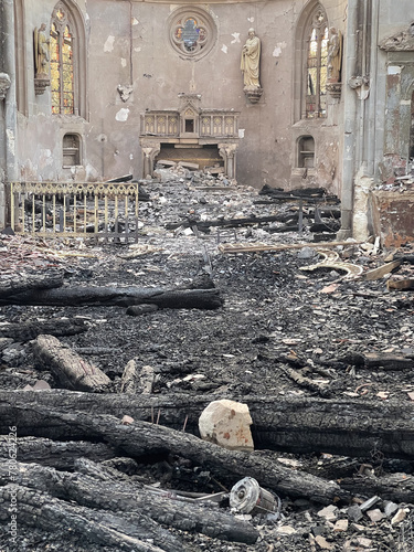 Catholic church destroyed by fire in Romilly-la-Puthenaye, Eure, Normandy, France photo