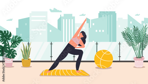 Sportswoman practices yoga training on rooftop terrace in megalopolis