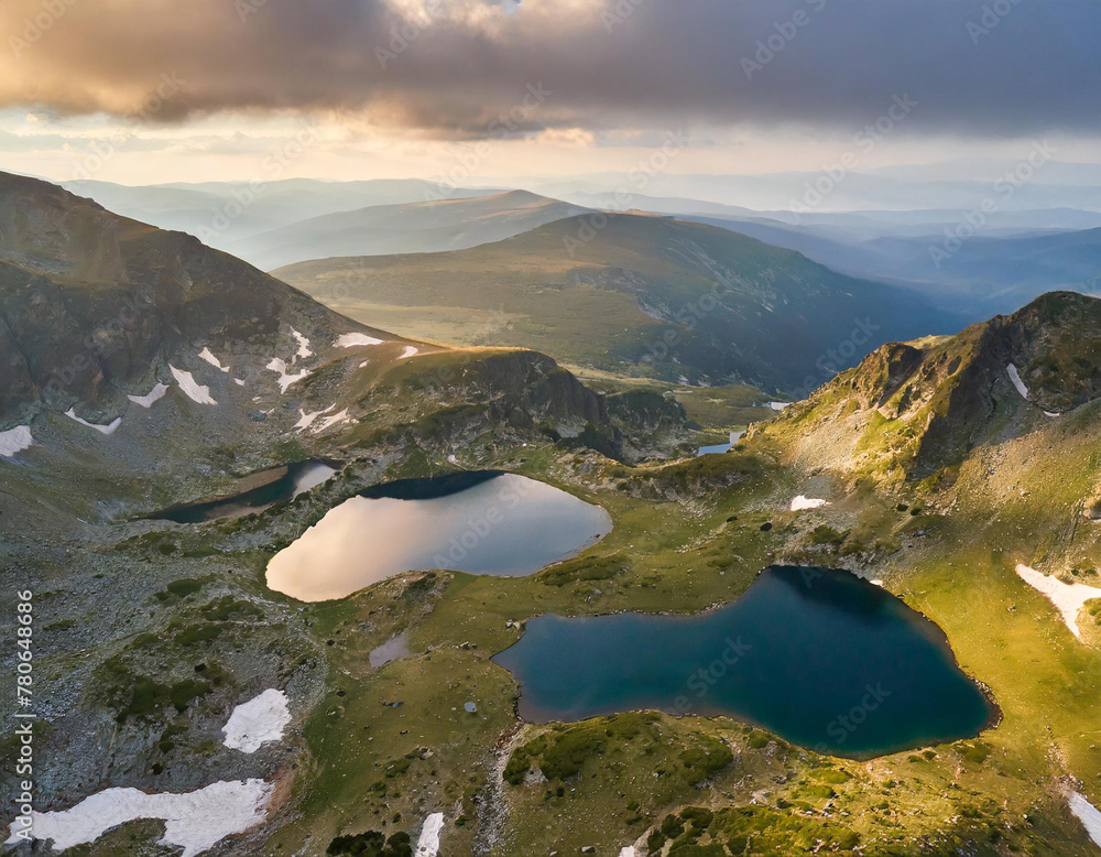 Aerial panoramic view of Seven Rila lakes, sunrise and nature of mountain range, hiking, trekking and tourism in Bulgaria
