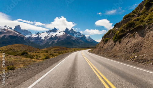 Travel along asphalt roadway on background of amazing highlands in Patagonia