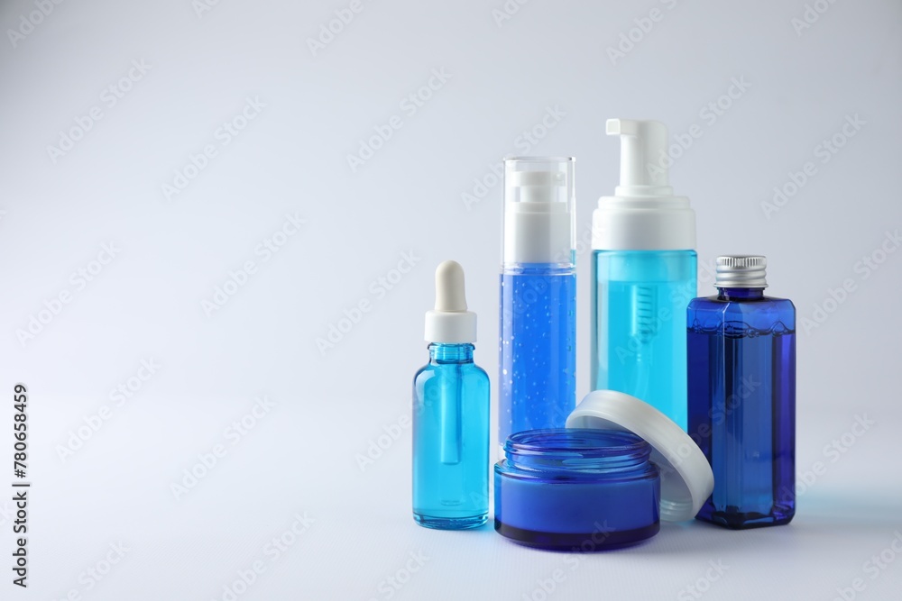 Set of luxury cosmetic products on white background. Space for text