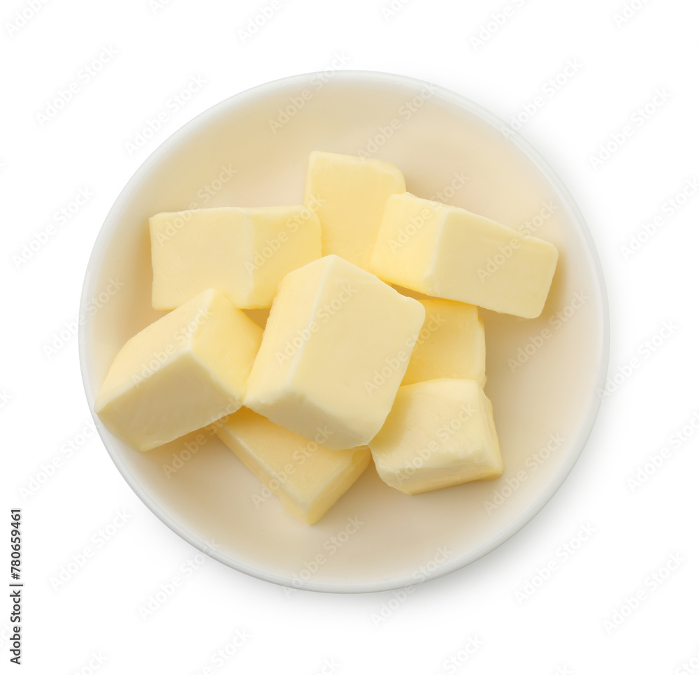 Tasty butter cubes in bowl isolated on white, top view Tasty butter cubes in bowl isolated on white, top view
