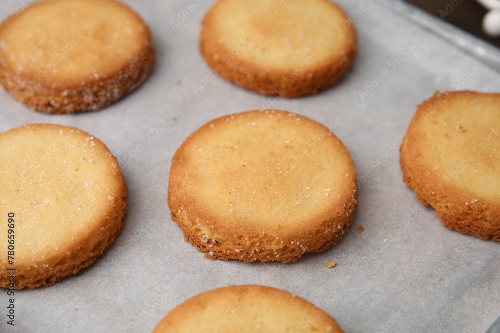 Tasty sweet sugar cookies on tray, closeup