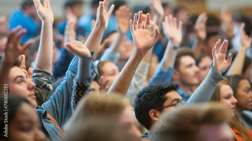 Enthusiastic Audience Raising Hands in Lecture Hall During Dynamic Discussion