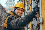 Male electrician installing and repairing wires