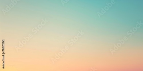 Gradient sky with pastel orange and teal hues blending smoothly into each other © Anna