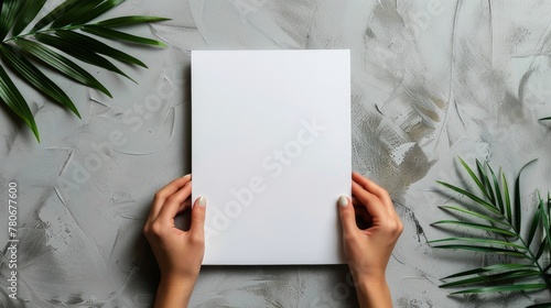 A person holding blank A4 paper in front of table. Generate AI image photo