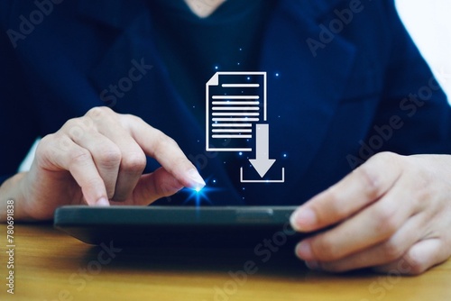 Businessman download document file to computer Cyber ​​backup storage technology. photo
