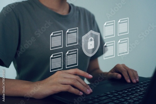 Business people use computers Quality assurance document, certificate concept electronic data.