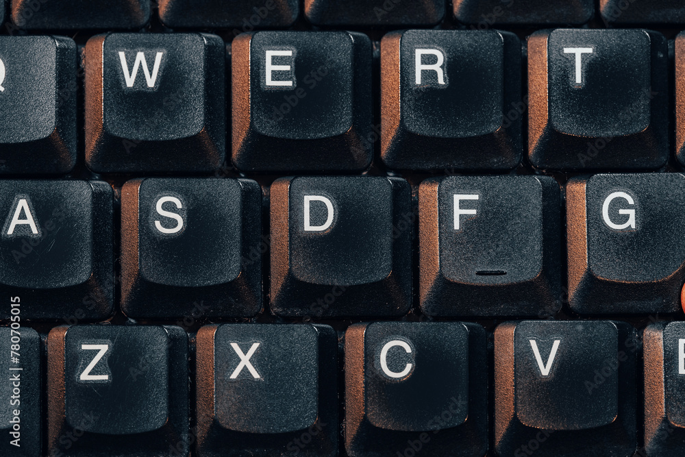 Old retro style aesthetic laptop computer keyboard with thick keys, top view shot from above, nobody, no people. Retro computing, typing writing text input simple abstract concept, many keys top down Old retro style aesthetic laptop computer keyboard with thick keys, top view shot from above, nobody, no people. Retro computing, typing writing text input simple abstract concept, many keys top down