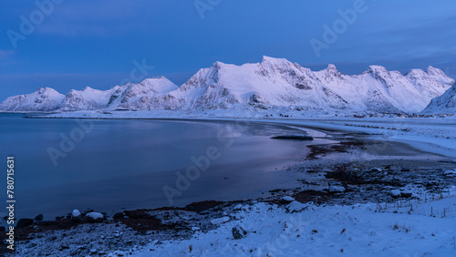 Fjord bei Sandbotnen, blaue Stunde in der Abenddämmerung, Schnee und Eis im Winter auf den Lofoten photo