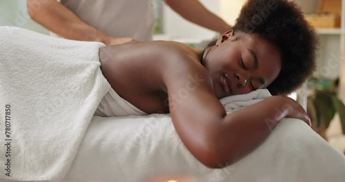 Woman, cupping therapy and back pain treatment or relax for blood flow benefits, drainage or inflammation. Black person, massage therapist and hands with circulation, pressure points or self care photo