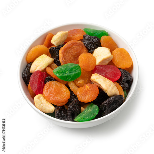 White bowl with dried fruit, tutti frutti, isolated on white background close up