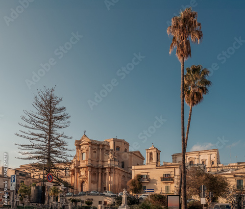 The main street of the baroque city of Noto with the church of San Domenico under sunset light, Syracuse province, Sicily, Italy