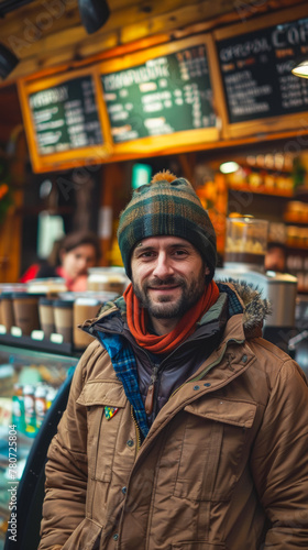 coffee shop owner standing in front of a coffee bar