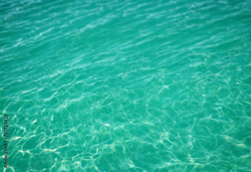 Blurred turquoise blue green water backdrop © Giuseppe Cammino