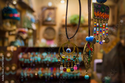 Colorful accessories on display window in a souvenir shop in Yazd, Iran.