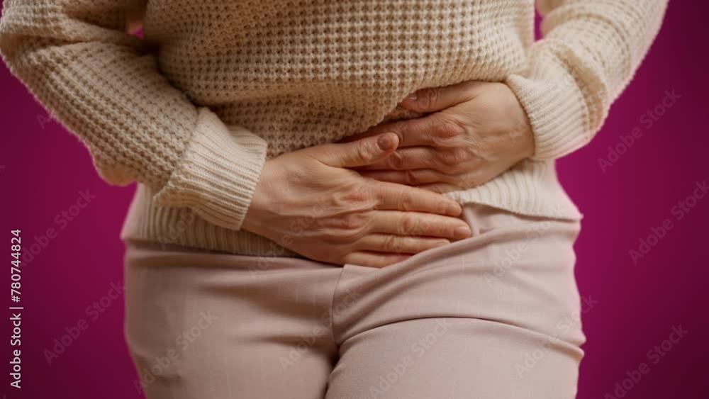 Woman suffering pain in lower abdomen, urinary tract infection, kidney stones Woman suffering pain in lower abdomen, urinary tract infection, kidney stones