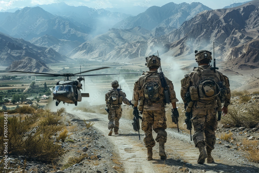 A squad of soldiers with full gear walks on a dusty road towards a military helicopter in a mountainous desert environment A squad of soldiers with full gear walks on a dusty road towards a military helicopter in a mountainous desert environment
