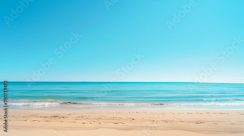 Under the clear blue sky  a sun-kissed beach invites relaxation and joy