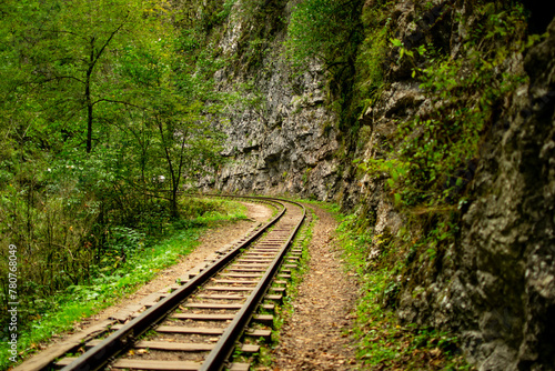 The railway runs through the rocks and mountains