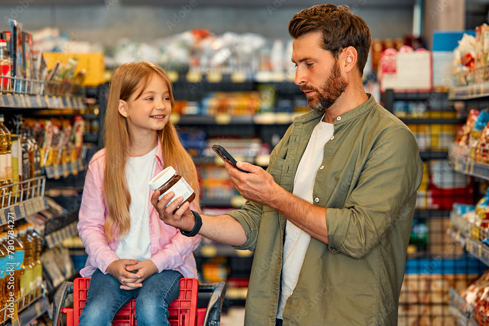 Family buying groceries in supermarket Family buying groceries in supermarket