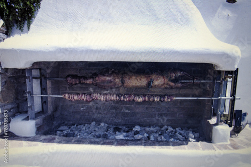 Cooking lamb on a spit. Easter in Greece is a traditional celebration.  Close-up.