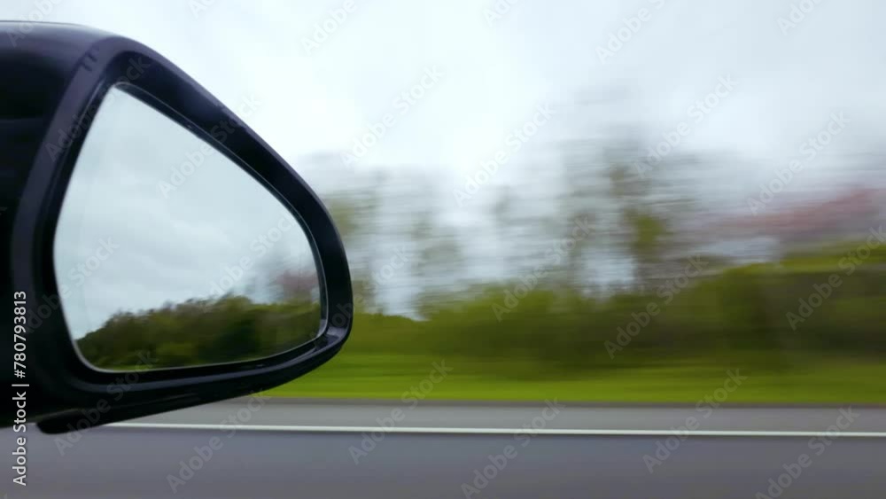 Modern car on highway. Window view with the mirror. 4k time lapse video