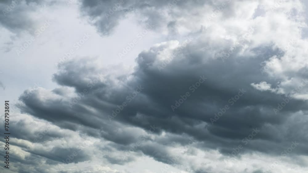 Dramatic cloudscape time lapse. Dark scene with white grey clouds Dramatic cloudscape time lapse. Dark scene with white grey clouds