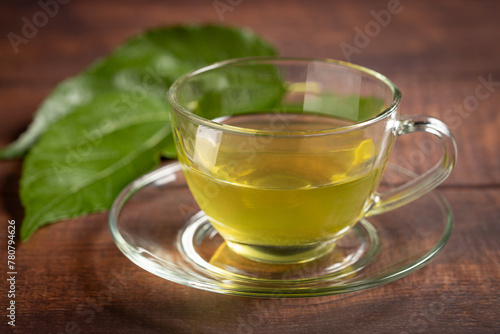 Mulberry Tea. Glass cup of mulberry leaf tea. © WS Studio