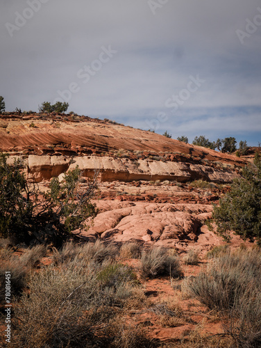 Layers of pink and red sandstone hills in Page Arizona desert