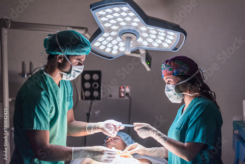Doctors operating photo