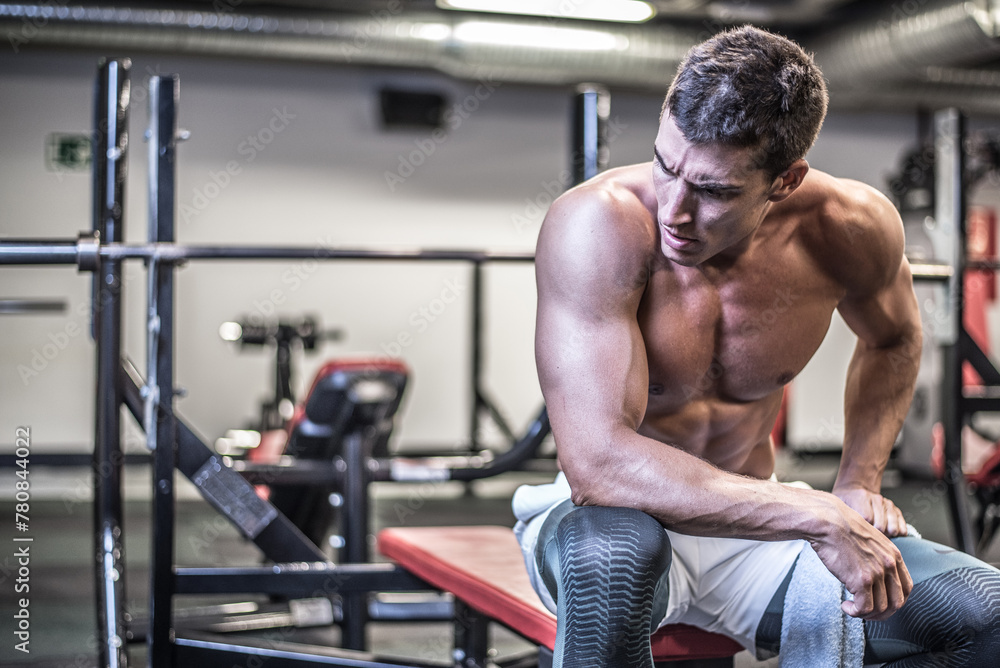 Muscular bodybuilder with towel Muscular bodybuilder with towel
