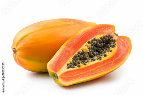Whole and half papaya on white background