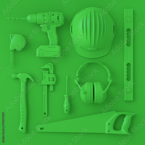 Top view of monochrome construction tools for repair on multicolor background