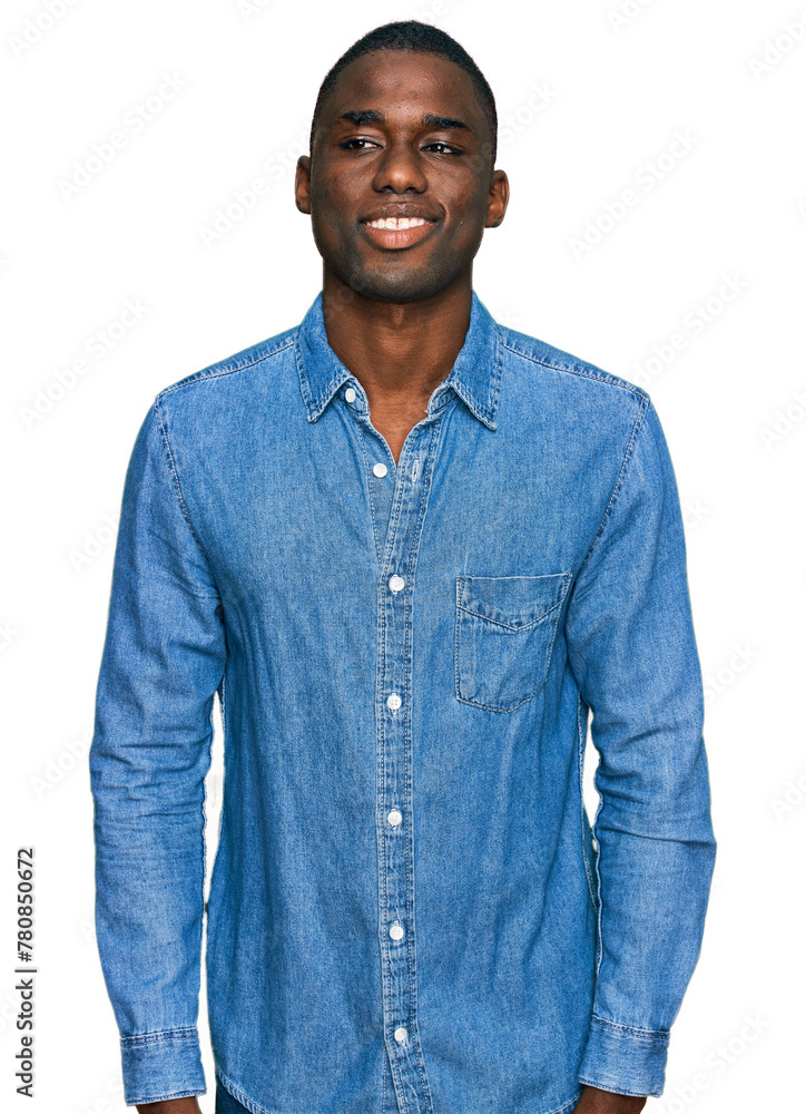 Young african american man wearing casual clothes with a happy and cool smile on face. lucky person. Young african american man wearing casual clothes with a happy and cool smile on face. lucky person.