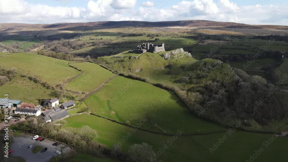 Aerial view of Carreg Cennen Castle on a rocky outcrop in Brecon Beacons National Park, Wales, UK Aerial view of Carreg Cennen Castle on a rocky outcrop in Brecon Beacons National Park, Wales, UK