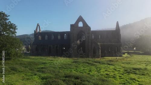 Drone shot of the ruins of Tintern Abbey, in the village of Tintern in Monmouthshire, Wales, UK photo
